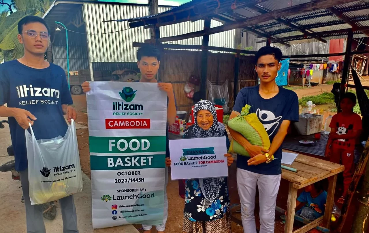 One of the recipients, a grandmother, appeared very pleased to receive our food basket.